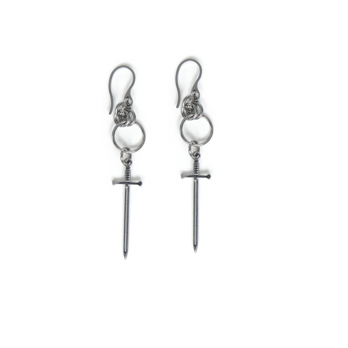 Pair of stainless steel earrings with chainmail detail and dangling sword charms on a white background