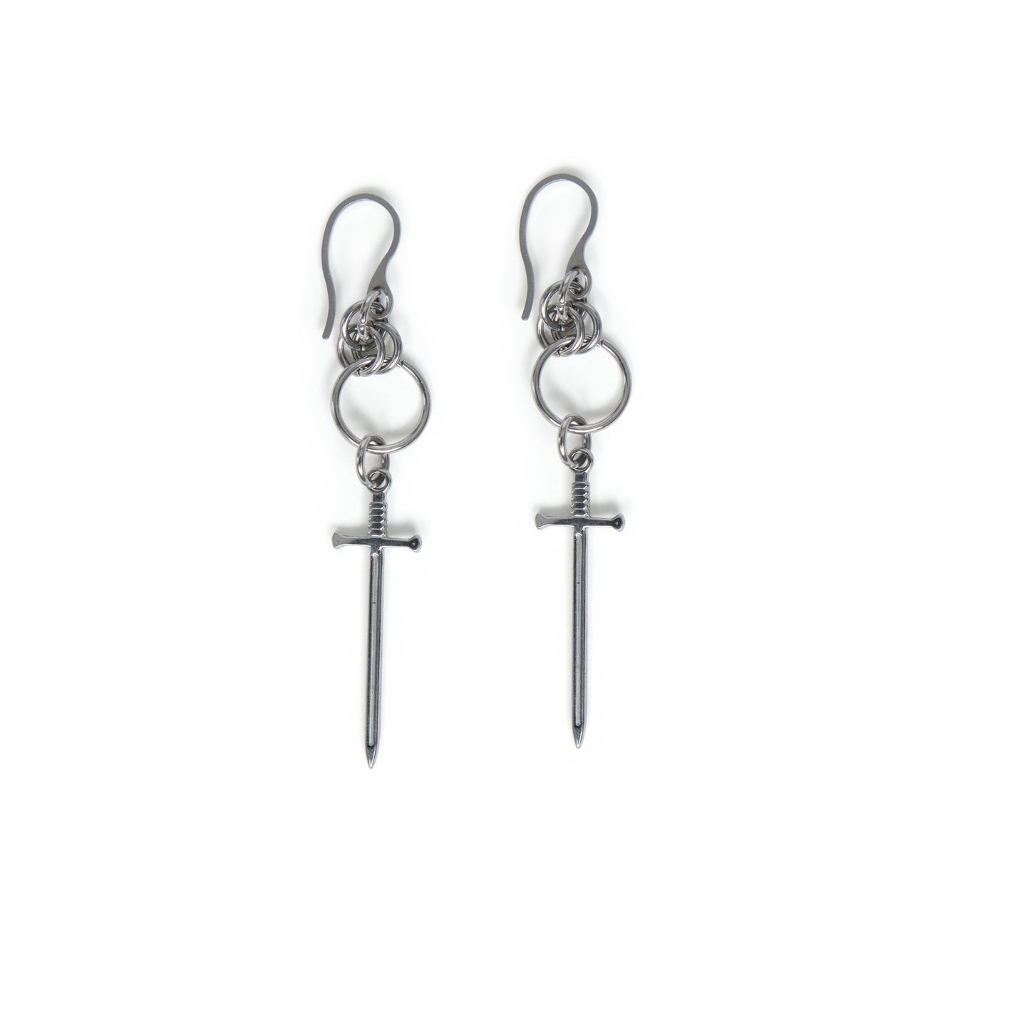 Pair of stainless steel earrings with chainmail detail and dangling sword charms on a white background