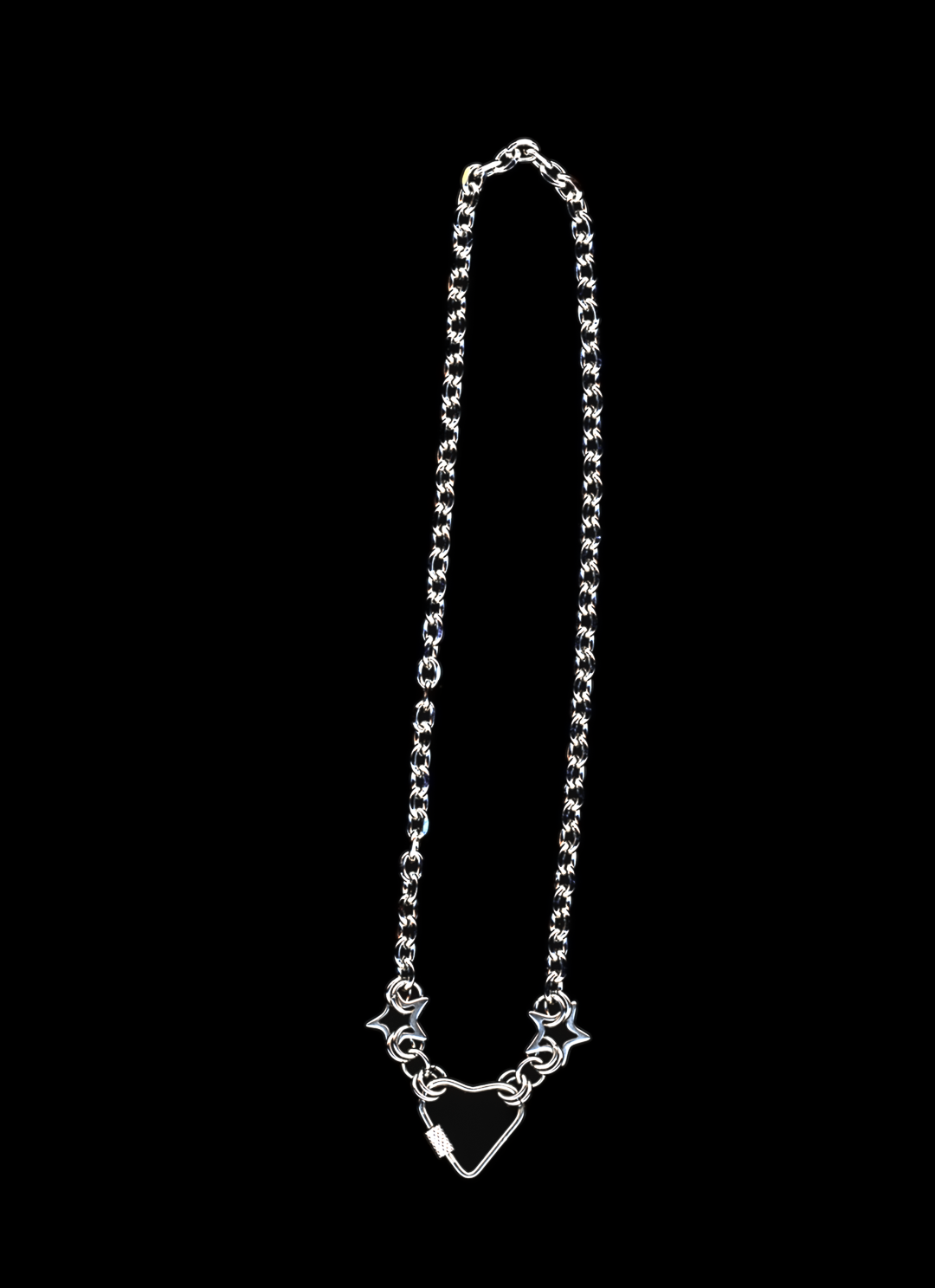 Stainless steel chain necklace with a heart carabiner closure surrounded by two chainmail stars on a black background