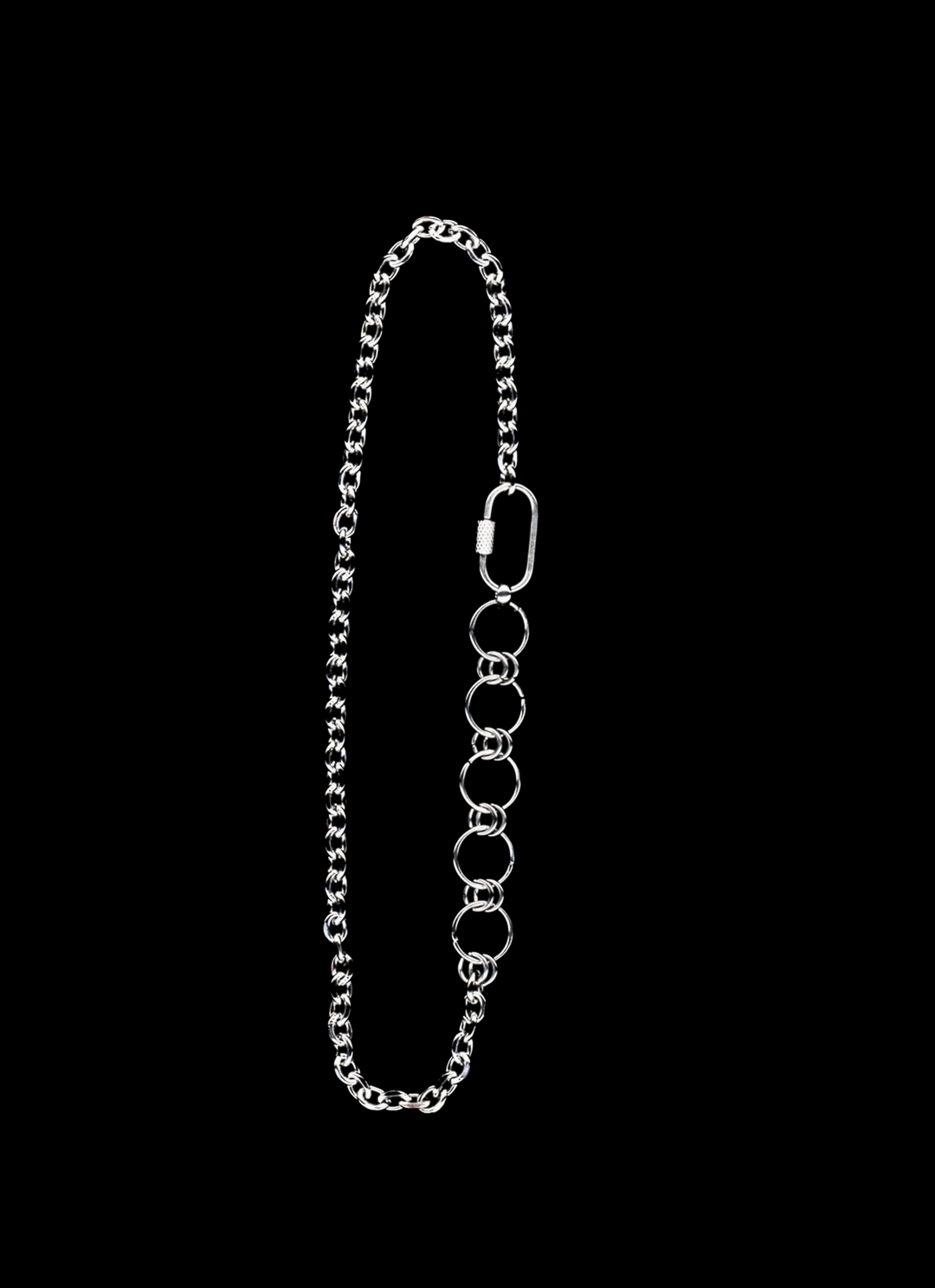 Stainless steel chain necklace on a black background