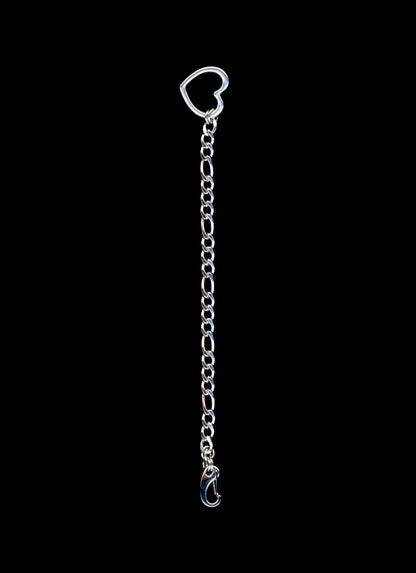 Silver chain with a heart-shaped clasp on a black background