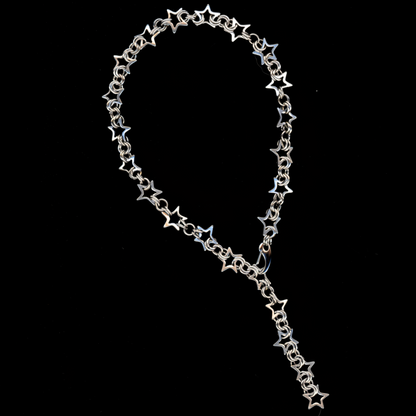 A stainless steel star chainmail necklace with a spring closure clasp, displayed against a black background.