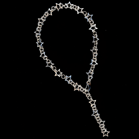 A stainless steel star chainmail necklace with a spring closure clasp, displayed against a black background.